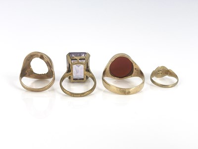 Lot 28 - Four gold rings, including carnelian signet...