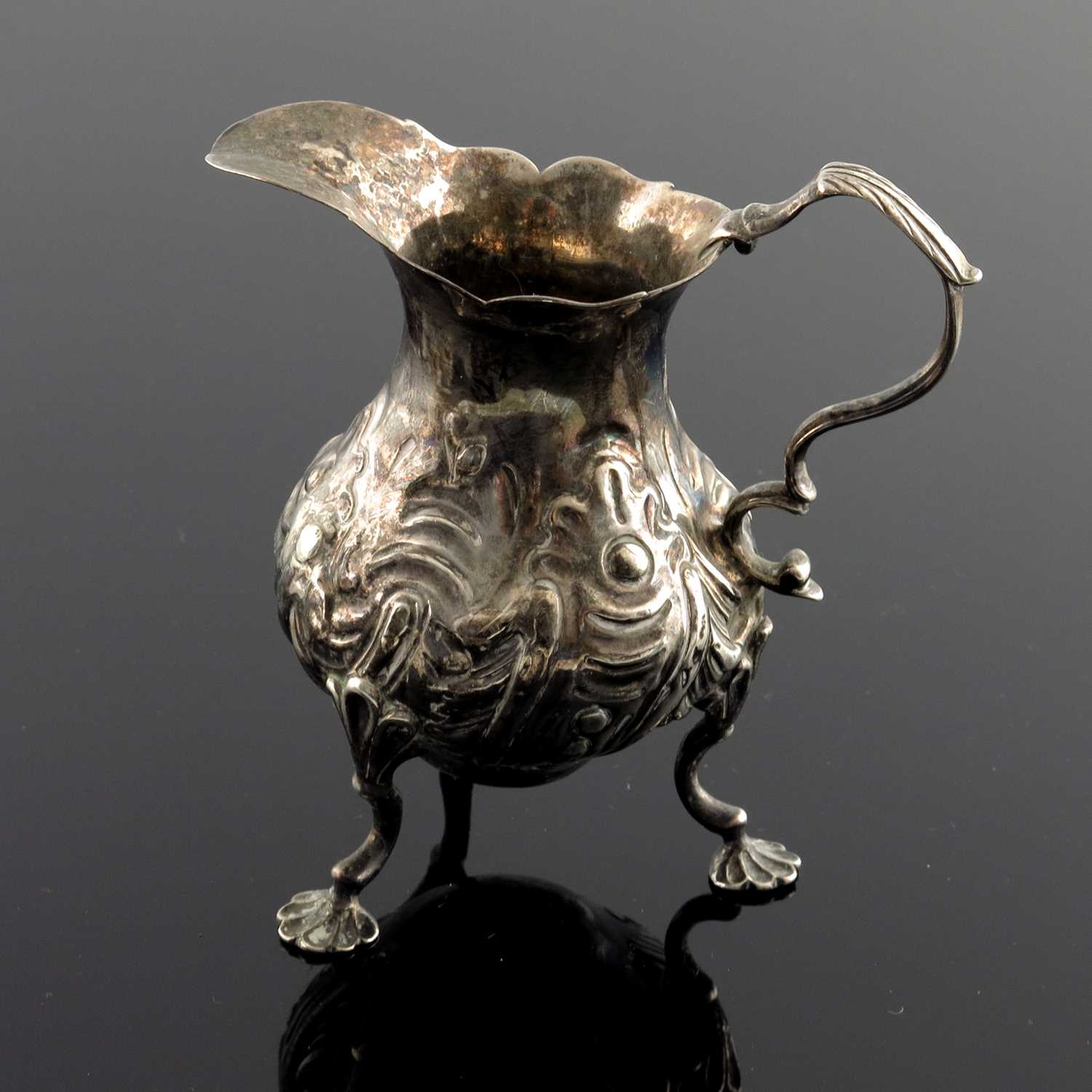 Lot 110 - An early George III silver cream jug, Samuel...