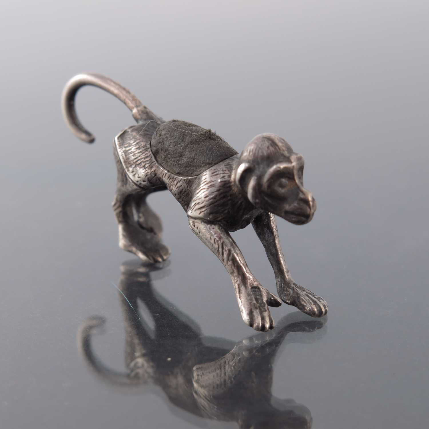 Lot 163 - An Edwardian novelty silver pin cushion, Levi...