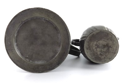 Lot 685 - A large German pewter tankard, dated 1733, and...