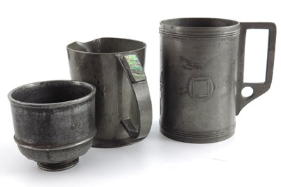 Lot 693 - A collection of pewter, to include a large...