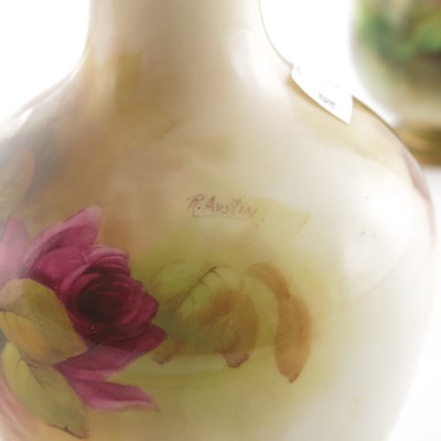 Lot 1055 - R Austin for Royal Worcester, two rose painted...