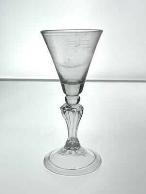 Lot 454 - A Dutch hollow baluster wine glass, circa 1740,...