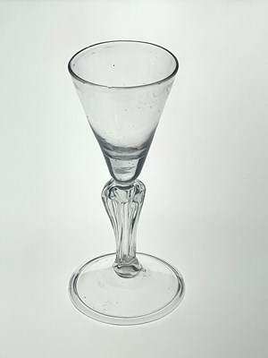 Lot 455 - A Dutch hollow baluster wine glass, circa 1740,...