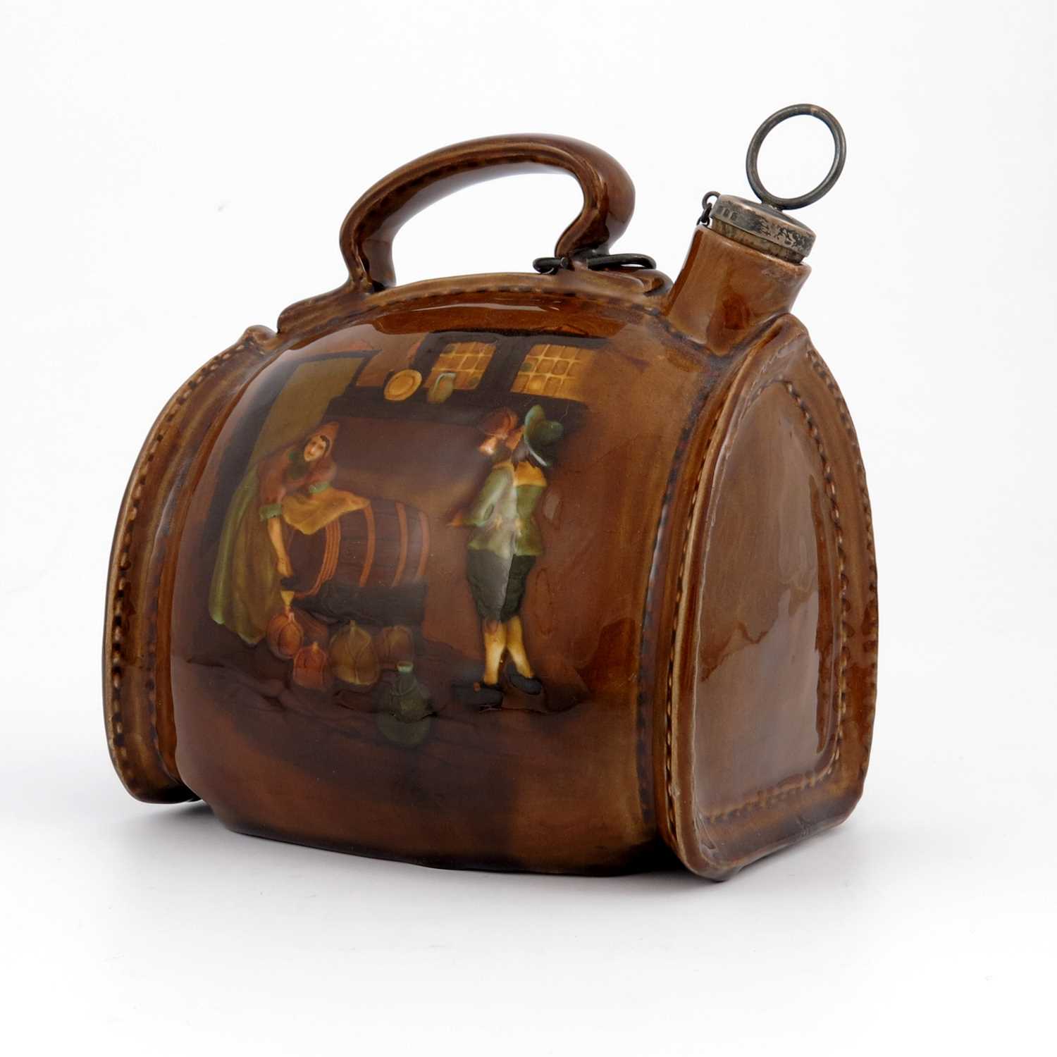 Lot 1085 - A Royal Doulton Kingsware leather bottle...
