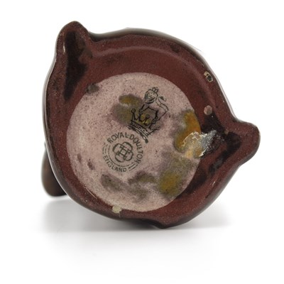 Lot 1101 - A Royal Doulton Kingsware figural whisky jug,...
