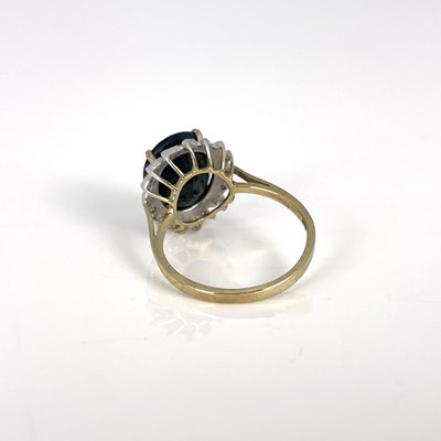 Lot 25 - A 9ct gold, sapphire and diamond ring, ring...