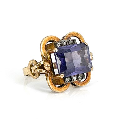 Lot 39 - A yellow gold synthetic sapphire and white...