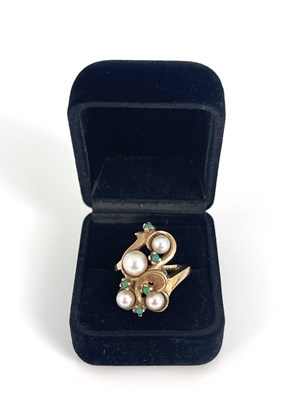 Lot 27 - A gold cultured pearl and turquoise scroll...