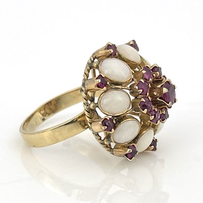 Lot 6 - An 18k gold opal and ruby cluster ring, ring...