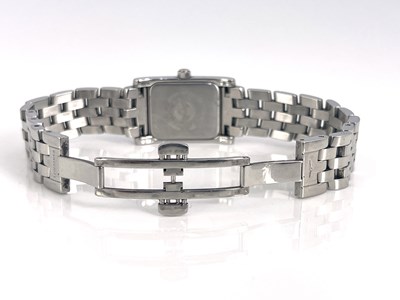 Lot 66 - Longines, a stainless steel watch with a white...