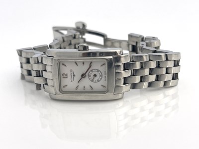 Lot 66 - Longines, a stainless steel watch with a white...