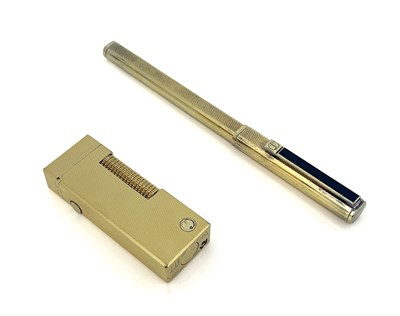 Lot 67 - Dunhill, a gold-plated lighter in the...