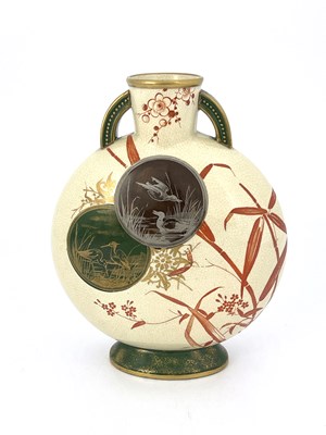 Lot 717 - An Aesthetic Movement moon flask, possibly...