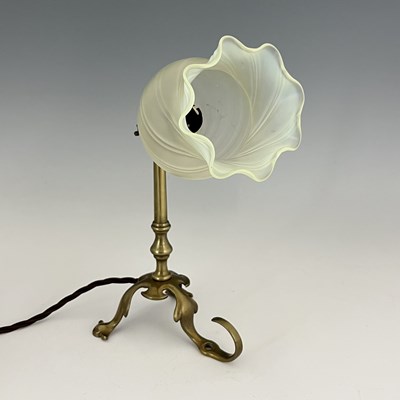 Lot 168 - An Arts and Crafts brass Pullman type lamp,...