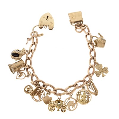 Lot 43 - A 9ct gold charm bracelet, with heart-shape padlock clasp