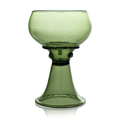 Lot 565 - An Arts and Crafts green glass Roemer type...