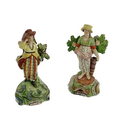 Lot 822 - A pair of Staffordshire pottery pearlware...