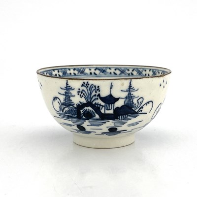 Lot 818 - A Lowestoft blue and white tea bowl, circa...