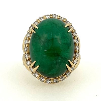 Lot 22 - A large cabochon emerald and diamond cluster...