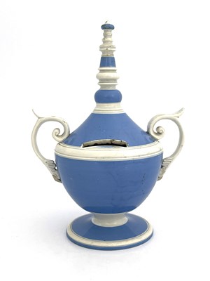 Lot 832 - A pearlware twin handled money box, circa 1800,...