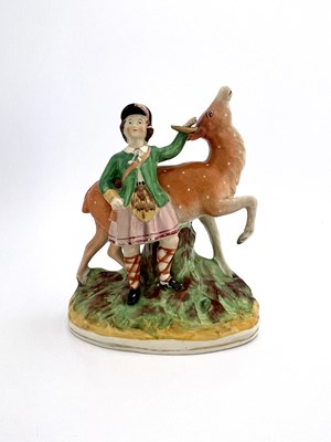 Lot 827 - A 19th century Staffordshire figure group, a...