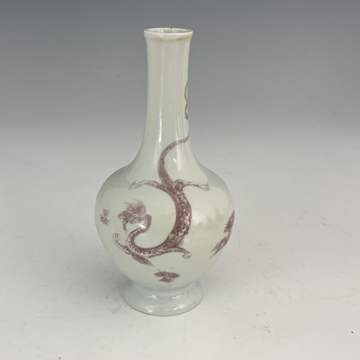 Lot 563 - A Chinese porcelain narrow-necked bottle vase,...