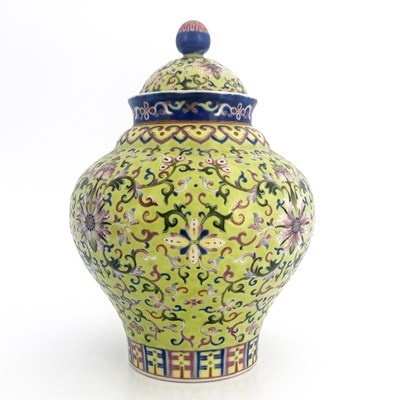 Lot 496 - A Chinese porcelain lime green lidded vase,...