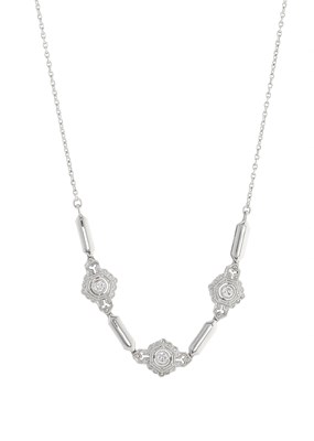 Lot 13 - An Edwardian 18ct gold circular-cut diamond...