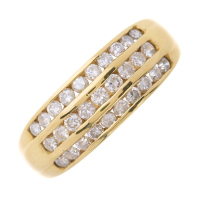 Lot 23 - An 18ct gold brilliant-cut diamond three-row...