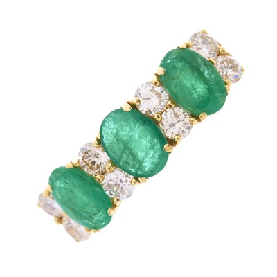 Lot 26 - A 14ct gold emerald three-stone dress ring,...