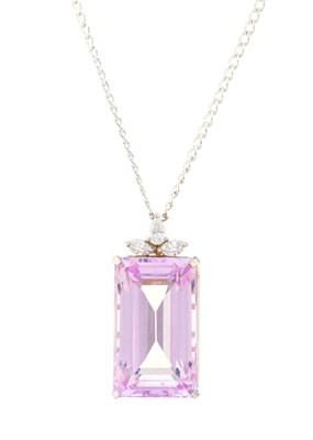 Lot 28 - A platinum kunzite single-stone pendant, with...