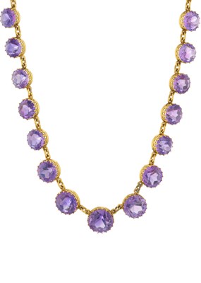 Lot 43 - A late Victorian yellow metal amethyst riviere...