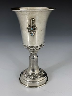 Lot 695A - An Israeli silver and gem set kiddush cup,...