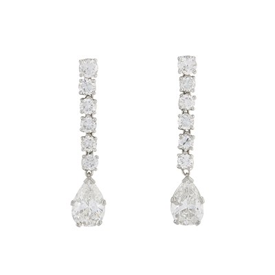 Lot 105 - A pair of 18ct gold pear-shape diamond drop...