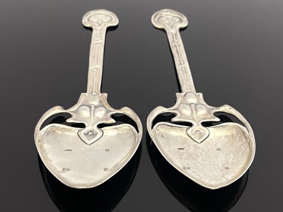 Lot 71 - A pair of Arts and Crafts silver spoons, TW,...