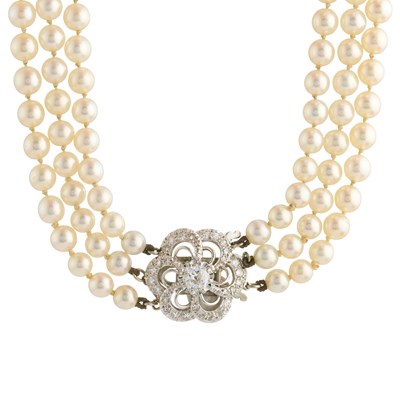 Lot 114 - A mid 20th century cultured pearl three-row...