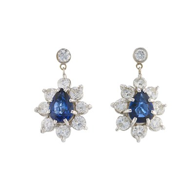 Lot 131 - A pair of 18ct gold sapphire and brilliant-cut...