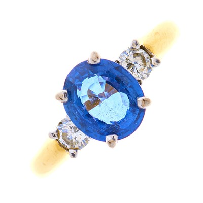 Lot 170 - An 18ct gold sapphire and diamond three-stone...