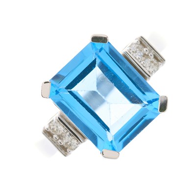 Lot 182 - A blue topaz dress ring, with brilliant-cut...