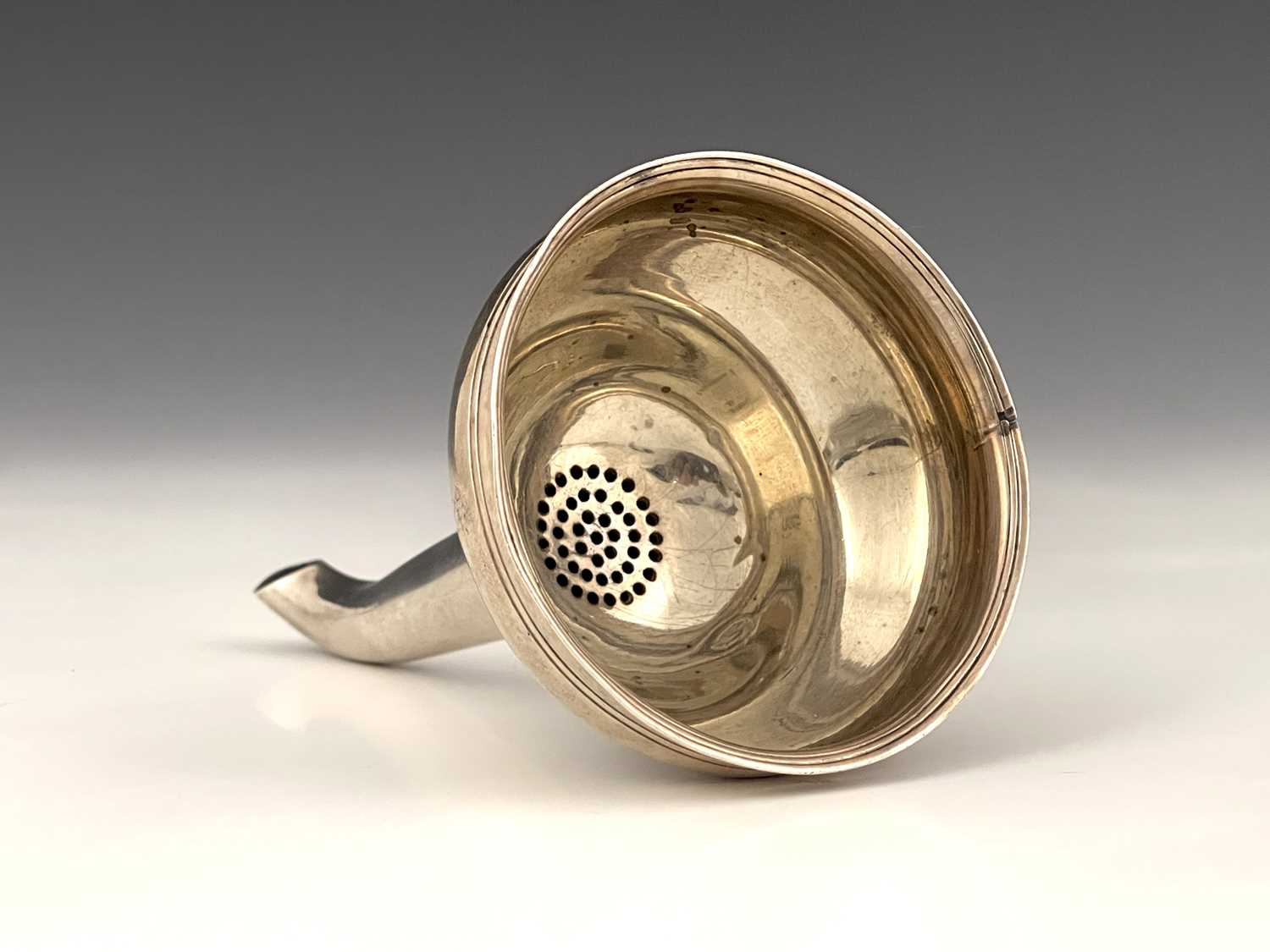 Lot 193 - An early George III silver wine funnel, London...