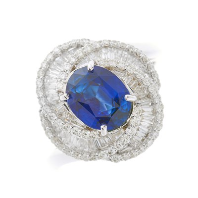 Lot 189 - An 18ct gold sapphire and diamond cocktail...