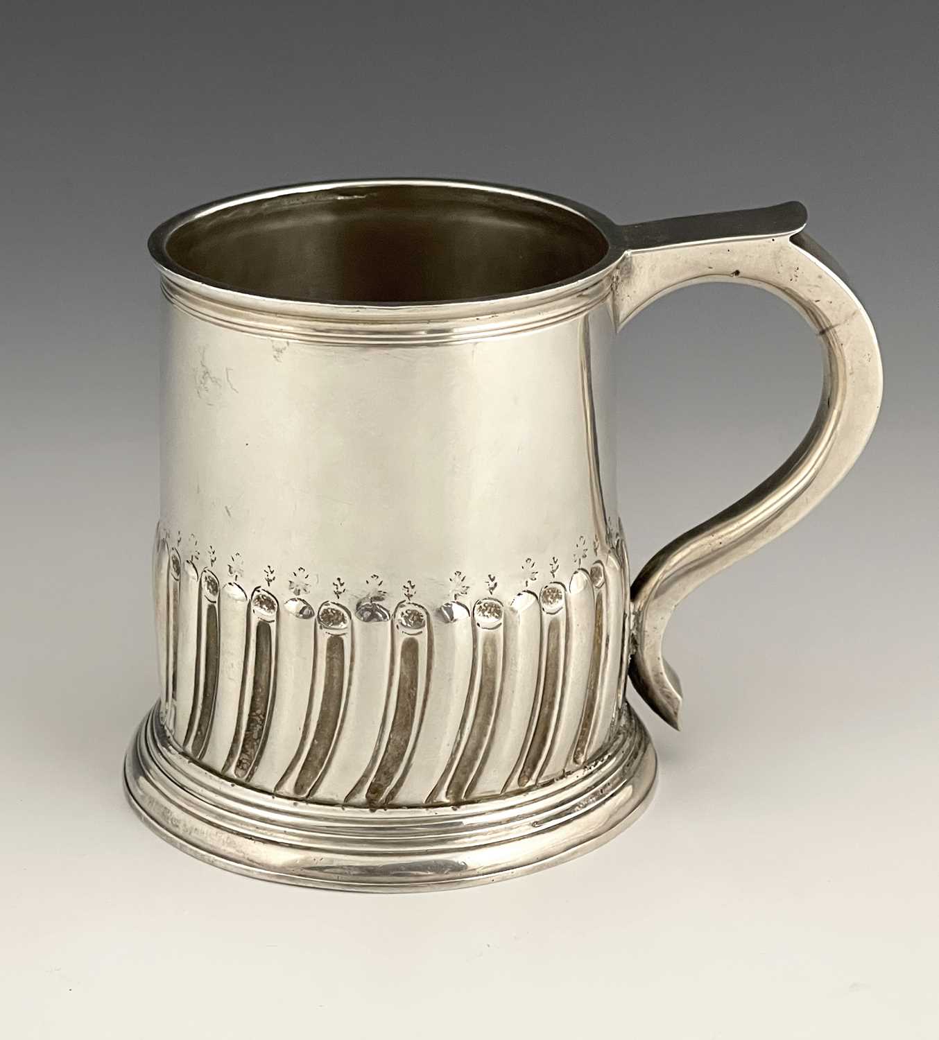 Lot 265 - A George I silver mug, William Gamble, London...