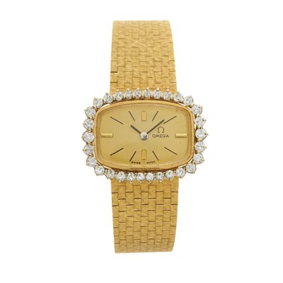 Lot 231 - Omega, an 18ct gold diamond bracelet watch,...
