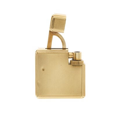 Lot 277 - Cartier, a 1938 Art Deco 9ct gold petrol wick...