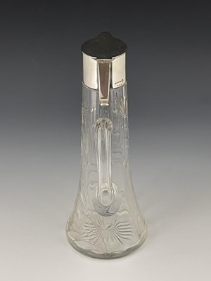 Lot 115 - An Arts and Crafts silver plated and cut glass...