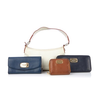 Lot 390 - Michael Kors, a baguette handbag and three...