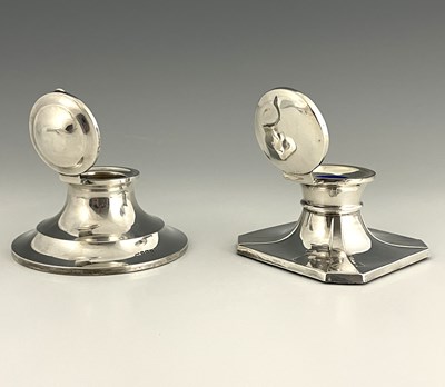 Lot 428 - Two George V silver capstan inkwells, one of...