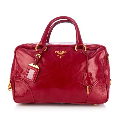 Lot 404 - Prada, a Bauletto handbag, crafted from glossy...