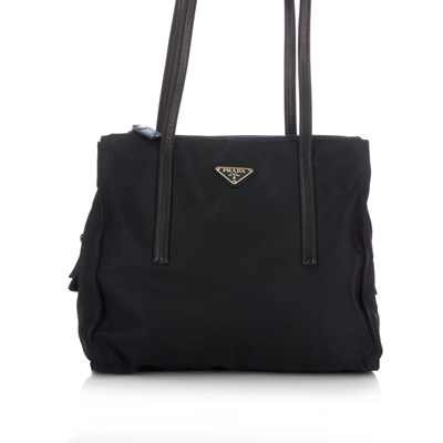 Lot 408 - Prada, a multiple zip tote, crafted from black...
